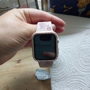 Pink Smartwatch with Sleek Design and Digital Display